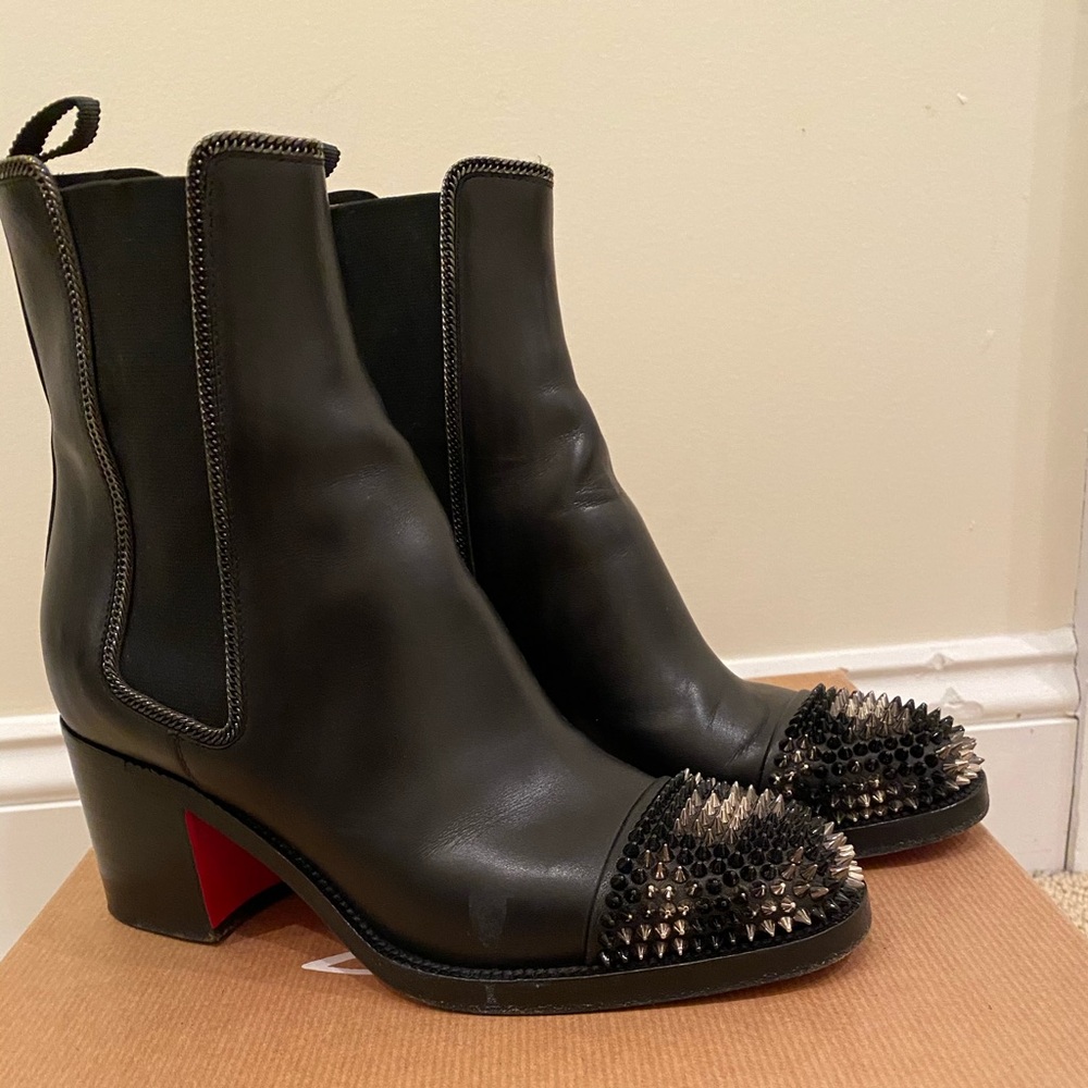 Christian Loubutin Boots 
size 5 
Black leather 
Used in great condition
